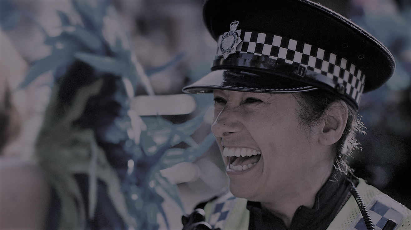 Two women and one man smiling